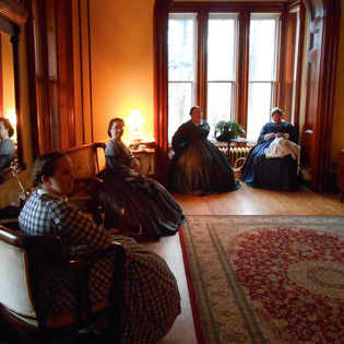 Ladies sitting in a parlor